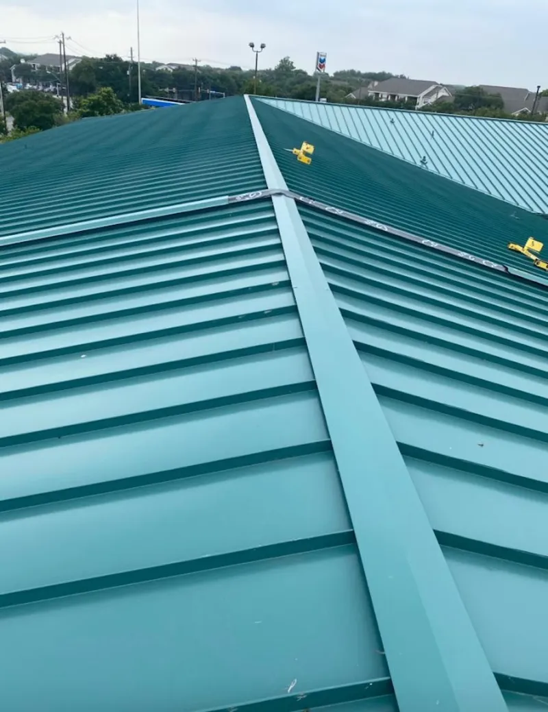 Green commercial metal roof ridge and valley for Metal Roof Repair in Montgomery Village